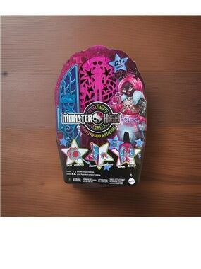 monster high playset packaging - pink, black & blue artwork